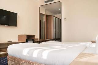 Отель Hotel Khanaka Türkistan Стандартный двухместный номер с 2 отдельными кроватями-1